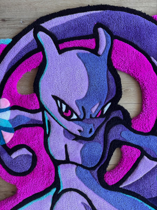 Handmade oversize area rug close-up of purple and blue Mewtwo character, looped texture