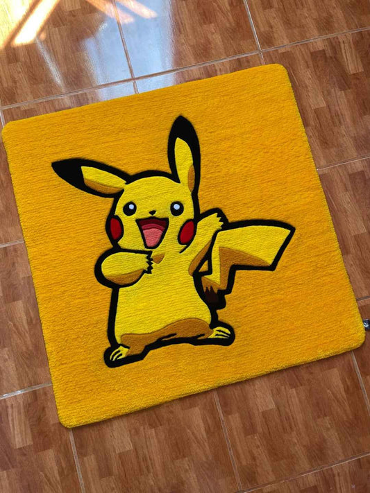 Pikachu character rug in bright yellow with black outline and red cheek accents